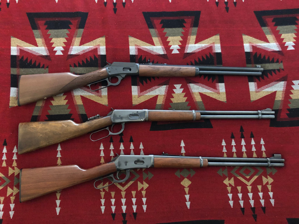 Picture of Clint's lever action lineup: Marlin 1894 .44 Magnum and two Winchester 94 30-30 rifles
