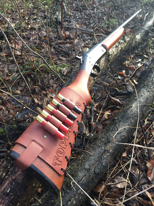 Squirrel gun 410 gauge H&R Topper break action shotgun with Cartridge Cuff buttstock shell holder